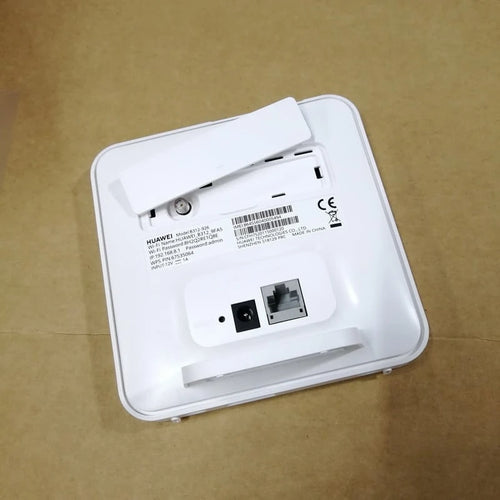 White electronic device with labels on a brown background
